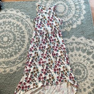 Nice dress with flowers and in good condition.